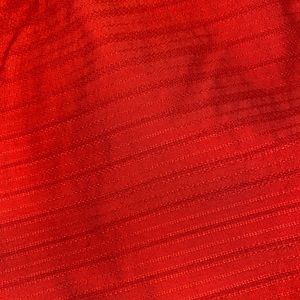 Women’s Red calf-length skirt.